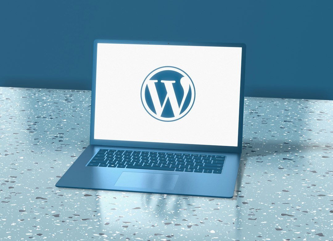 Laptop showing the WordPress logo, illustrating what's new in WordPress 7.1.1 and 7.2