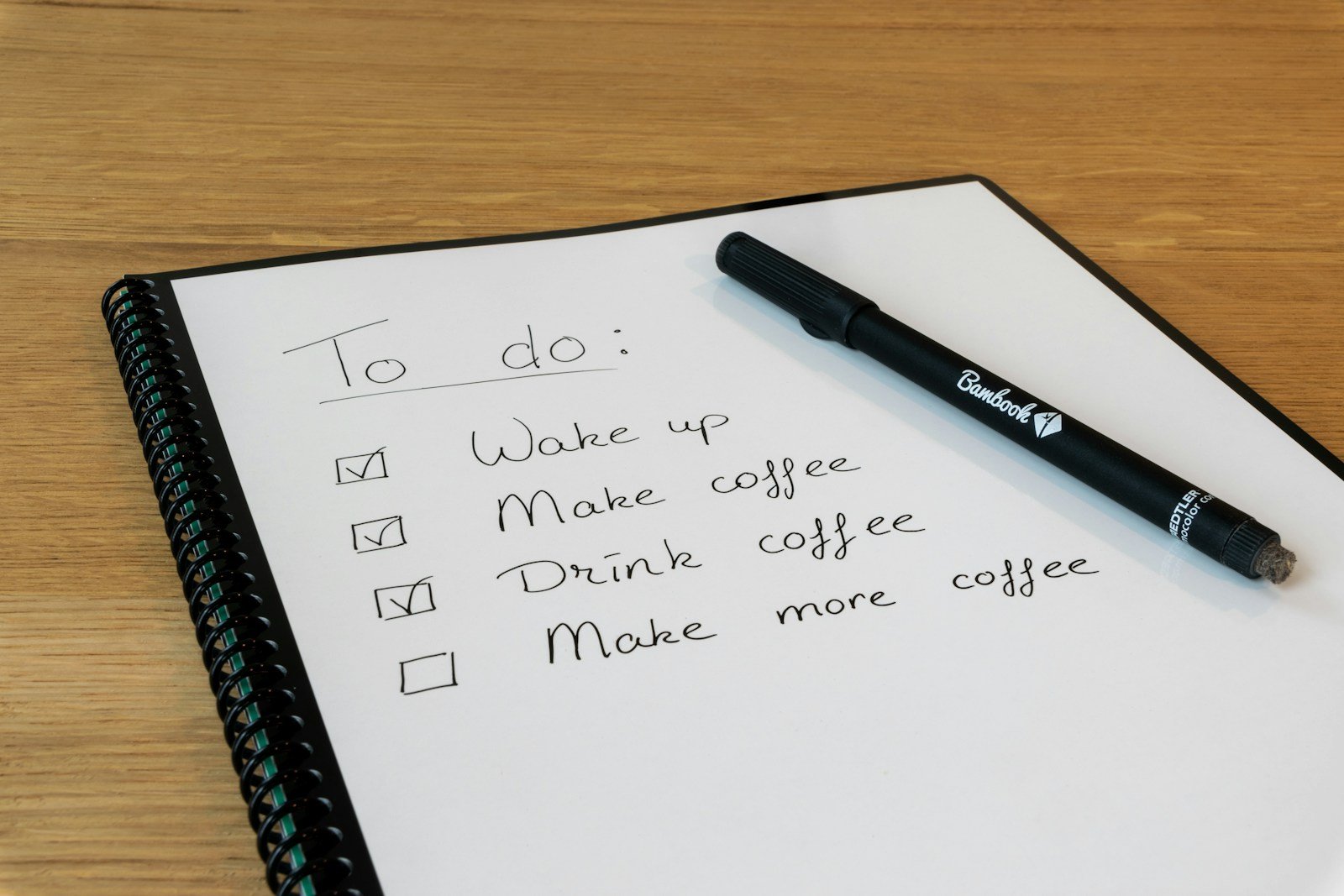 Notepad and pen for a short homepage clarity checklist