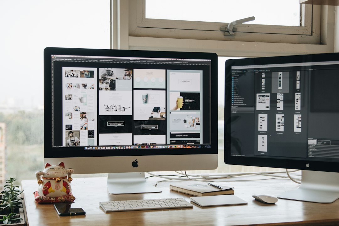 iMac on a clean desk, a typical place to design a marketing site in Webflow or WordPress