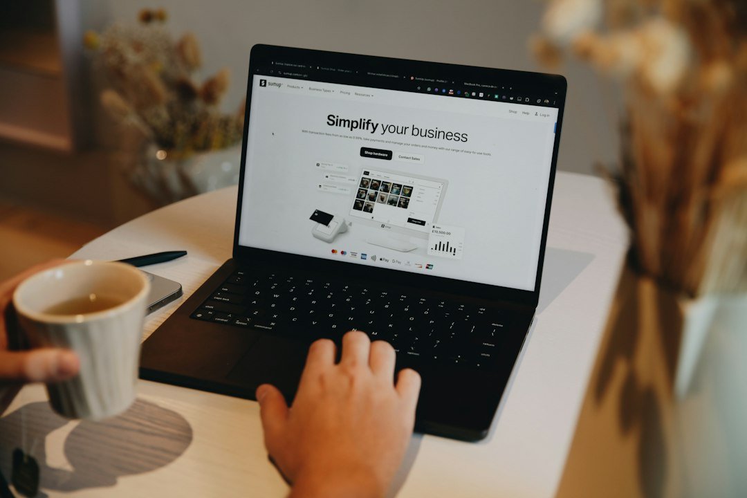 Laptop showing small-business tools, used to talk about what a WordPress website really costs