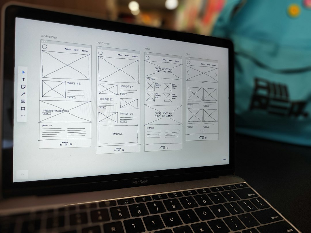 Website wireframe on a MacBook, deciding whether Elementor Pro is worth the upgrade